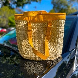 Straw and yellow purse
